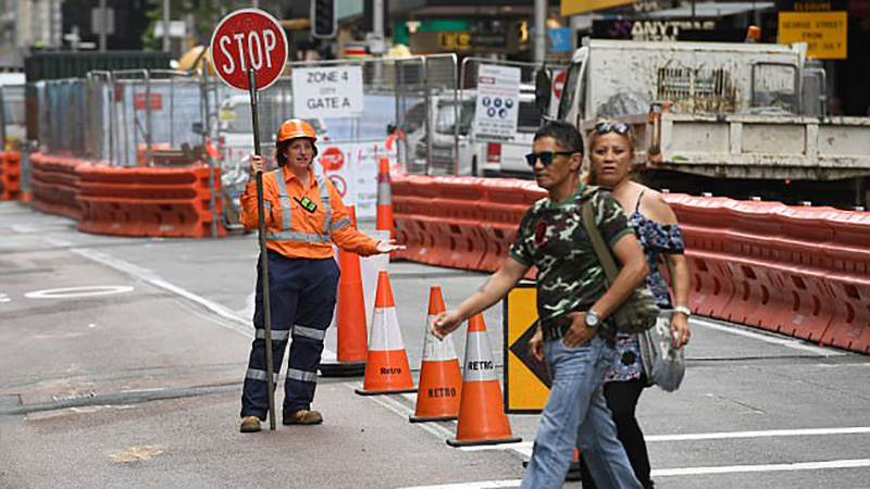 478D5DFB00000578-5209121-A_traffic_controller_is_pictured_working_at_a_building_site_in_c-a-1_1514072724154