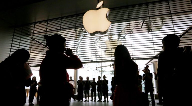 Apple shop employees welcome their customers in the morning. The First batch of Apple Watch arrived at Apple Store at IFC, Central, Hong Kong. 24APR15