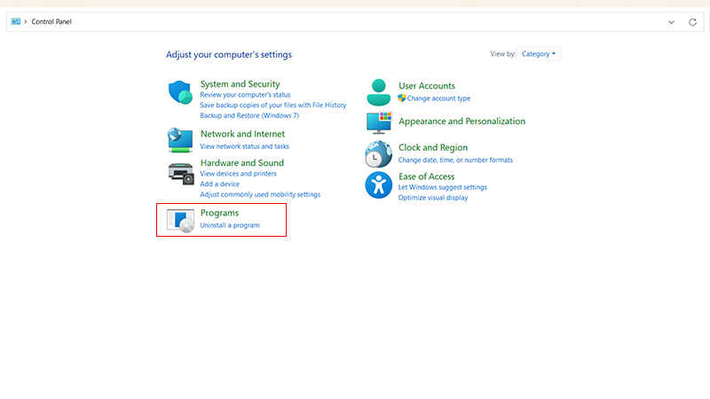 Bước 1: Mở Control Panel và chọn Programs