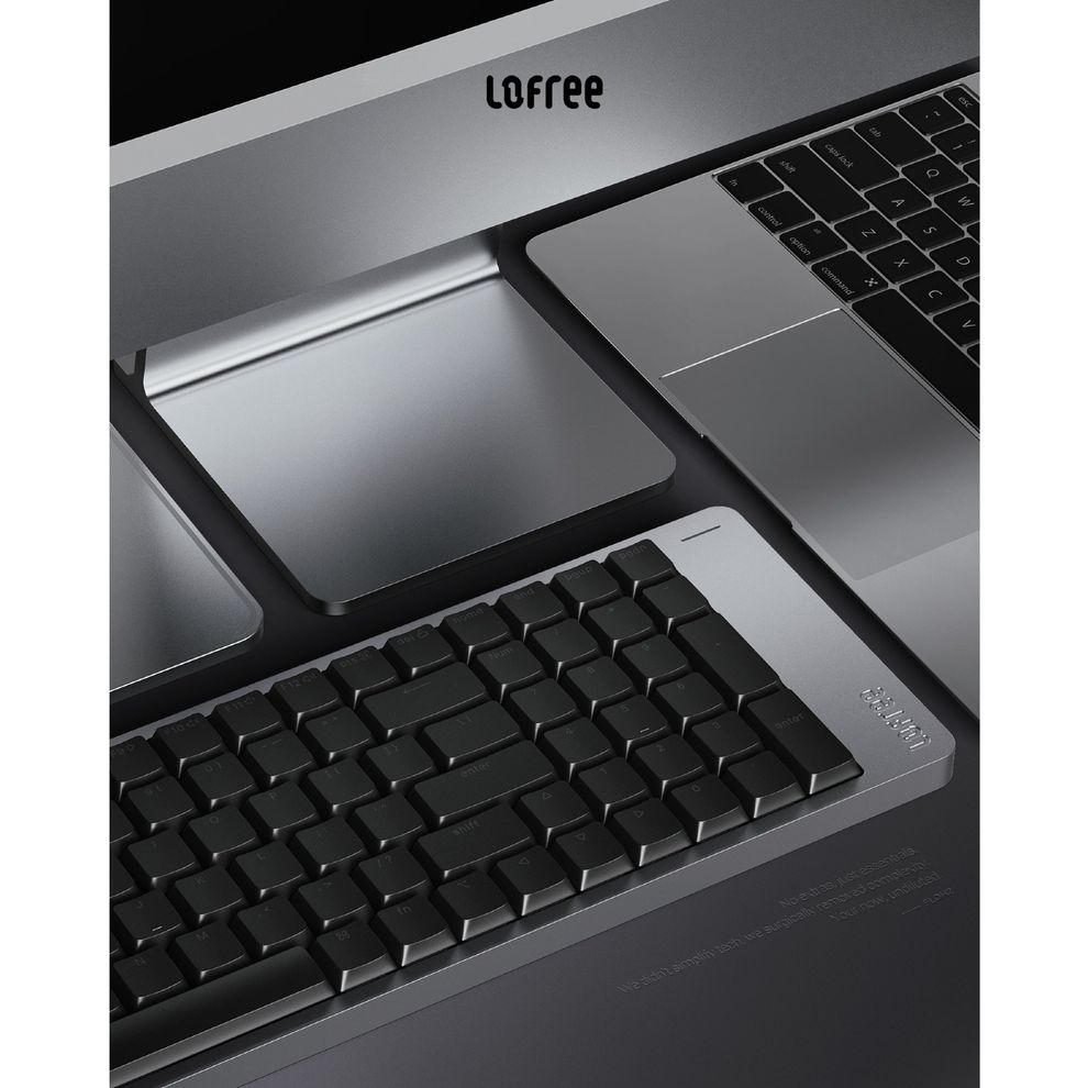 ban phim lofree low profile ben canh laptop