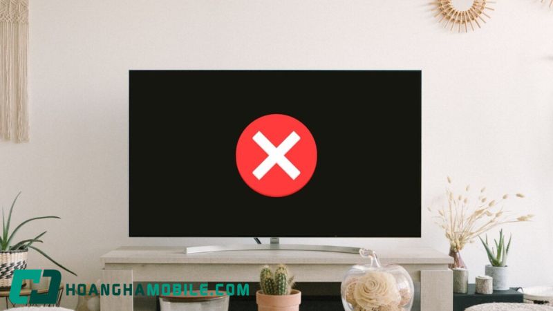Dùng đèn pin rọi xiên vào màn hình tivi để kiểm tra đèn nền